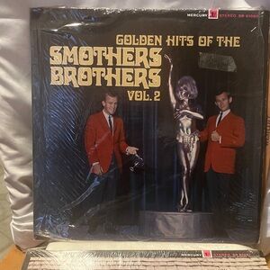 Set of 2. 1950s -1970s  Smothers Brothers album in perfect condition dont think